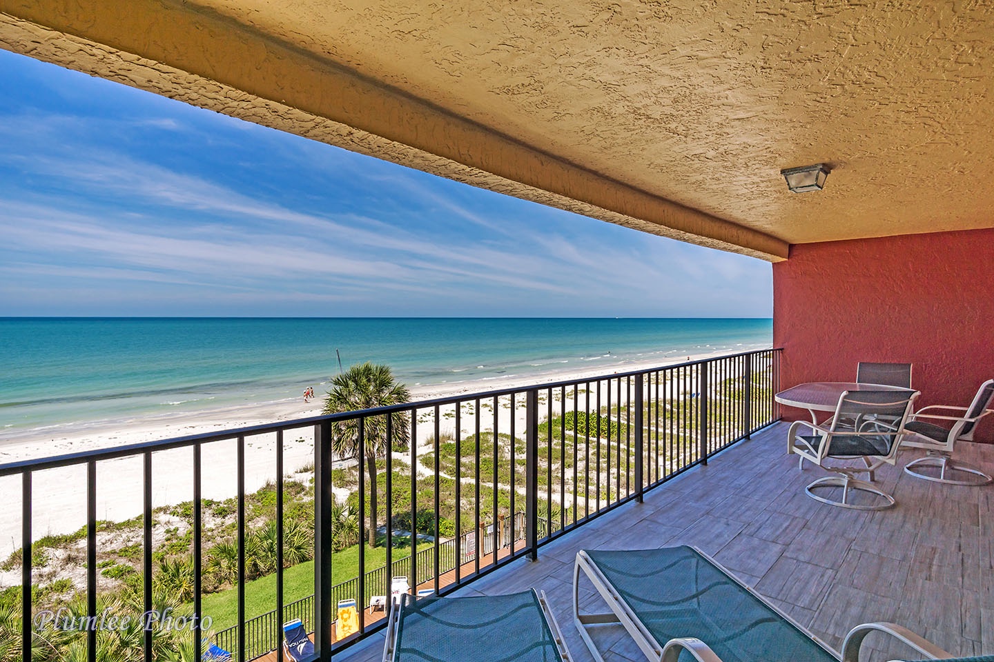 Large balcony with a beach front view north and south.
