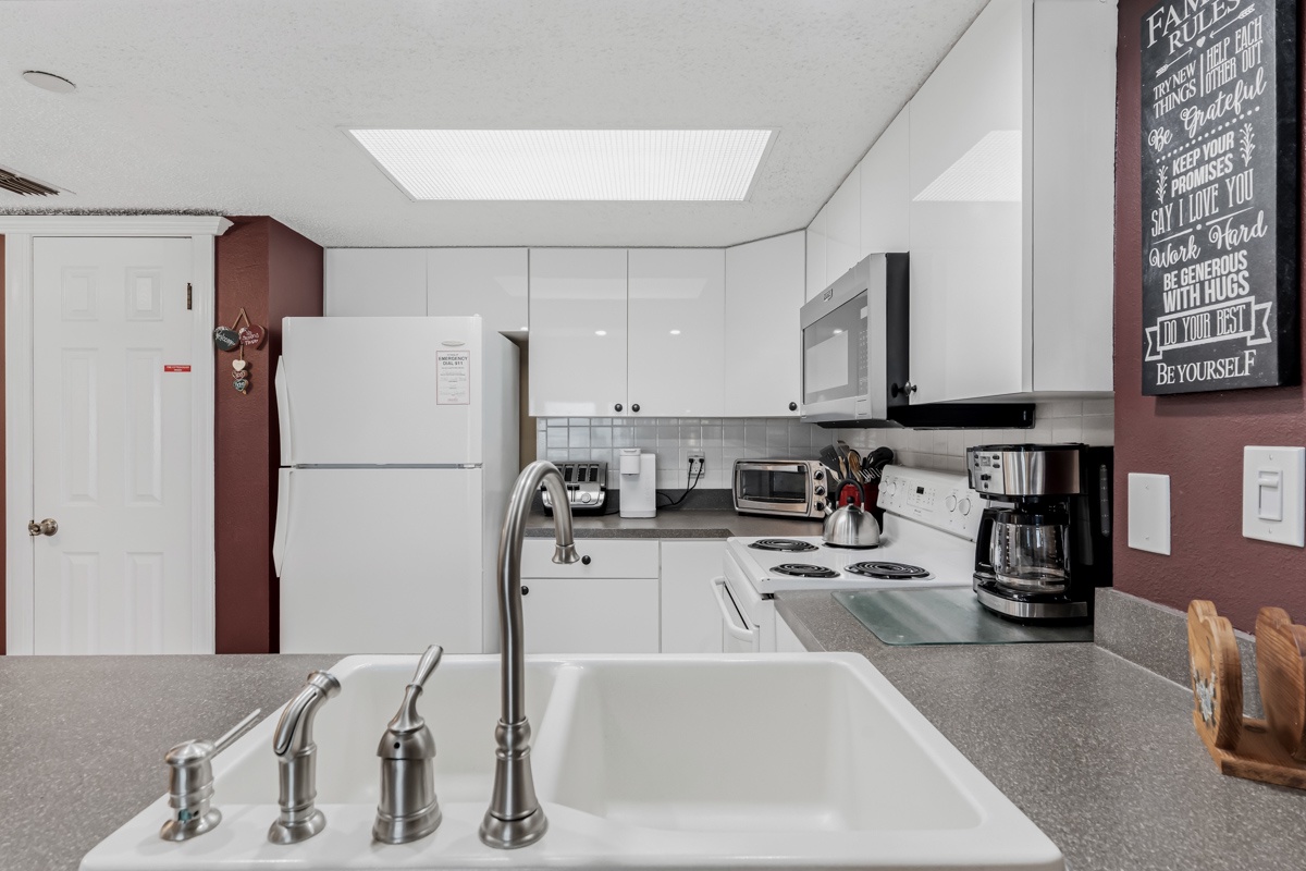 Your fully equipped kitchen features modern appliances, granite countertops, and all the essentials to prepare delicious home-cooked meals during your stay.