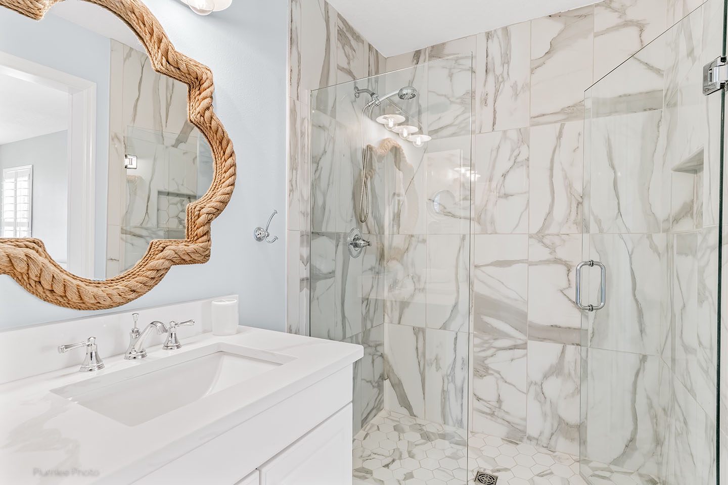 Primary ensuite bathroom has step-in shower