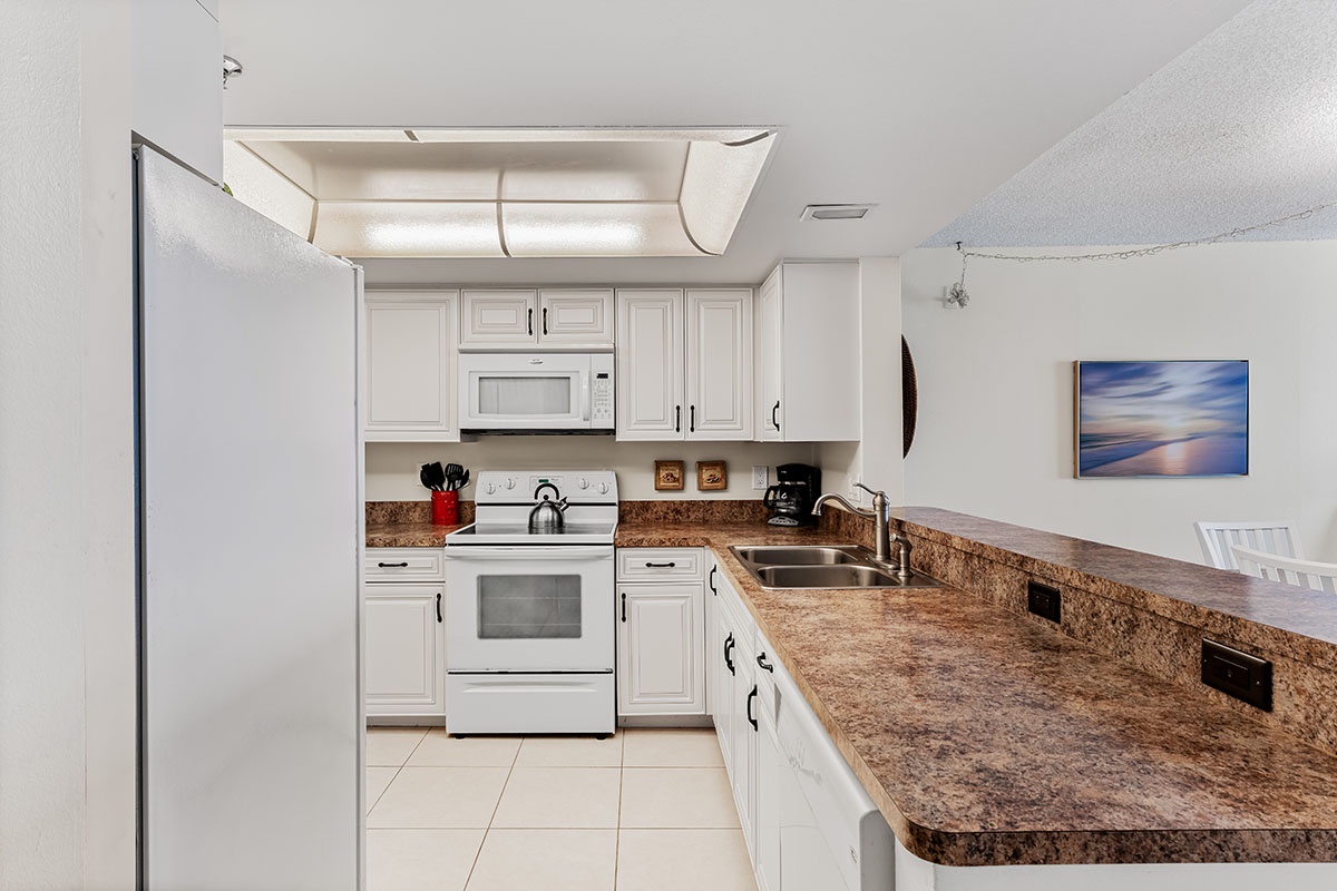 Your fully equipped kitchen invites culinary adventures with granite countertops, modern appliances, and everything needed for memorable meals.