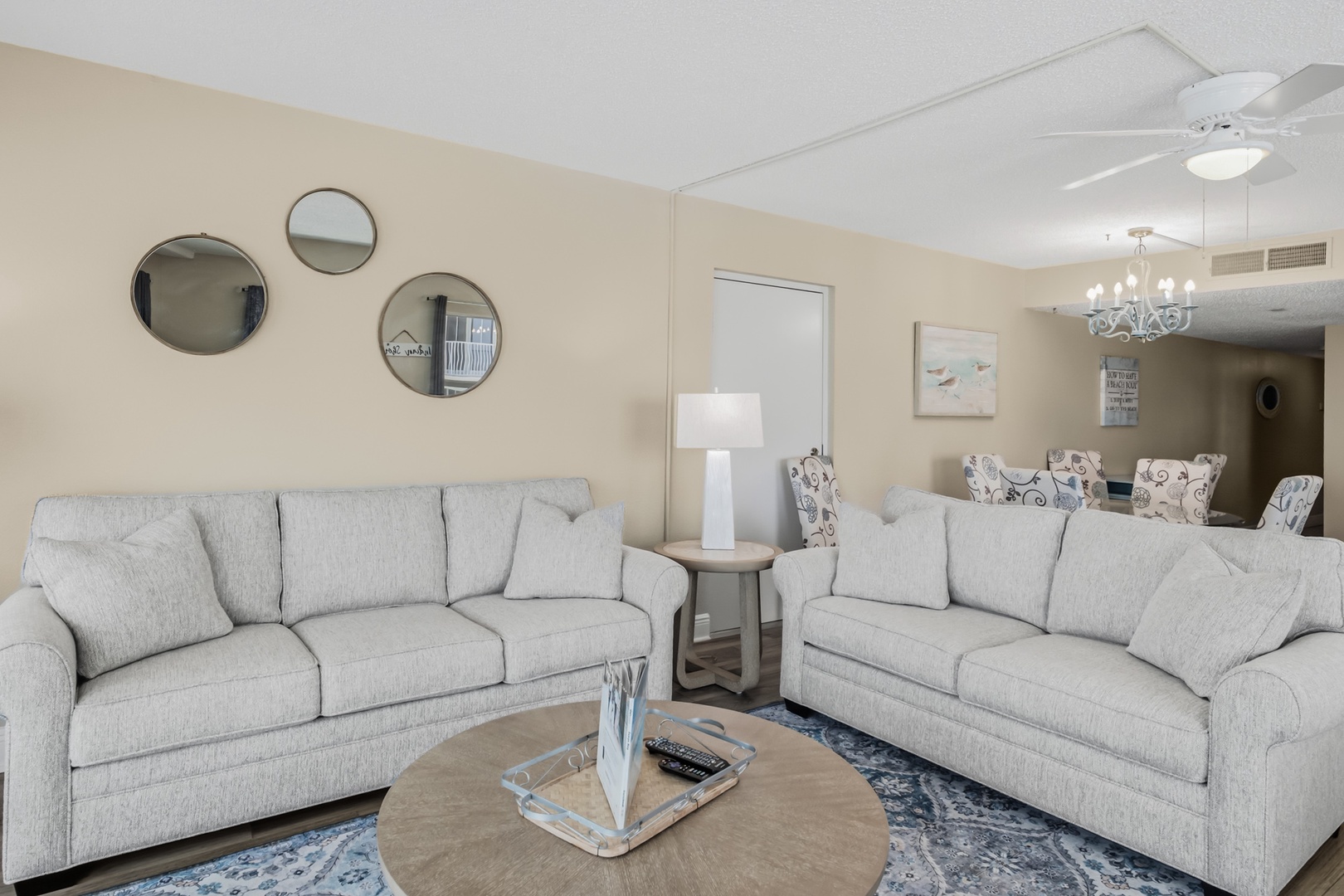 Sink into plush seating with your favorite book or conversation. This bright, inviting living room is designed for your comfort and relaxation.