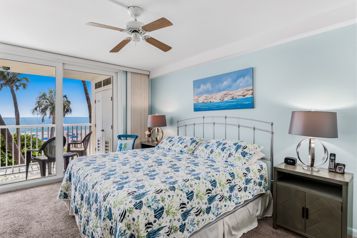 Wake up to gentle ocean breezes and stunning sea views from your own private balcony. This serene coastal King bedroom invites you to relax and recharge in style.