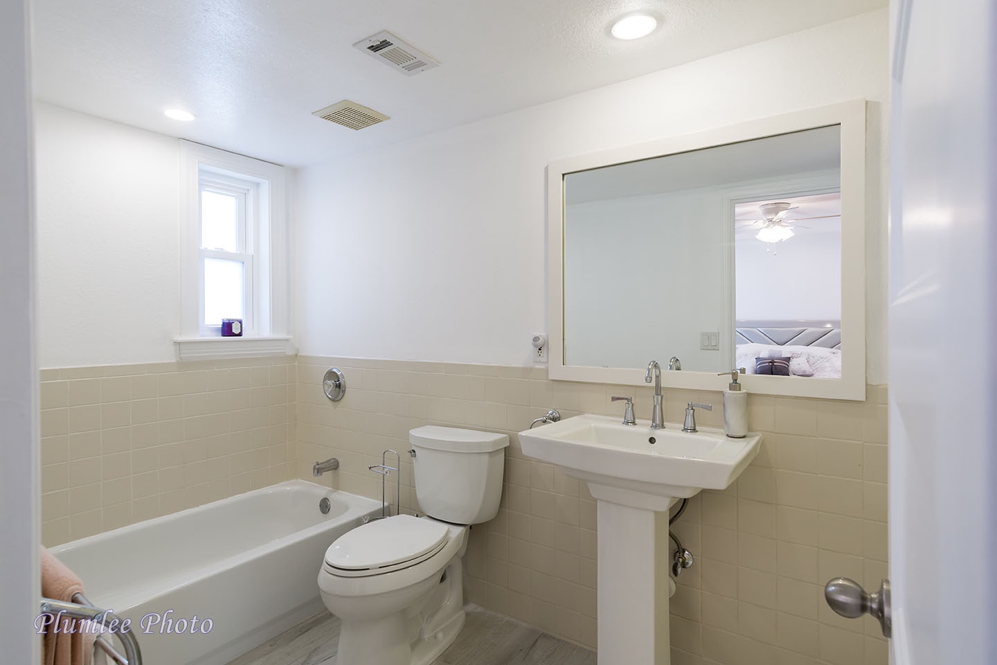 There's a tub on the opposite side of the Master Bathroom.