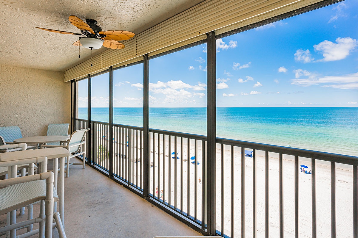 Step onto your private oceanfront balcony and breathe in the sea breeze while enjoying stunning views of turquoise waters and pristine beach.