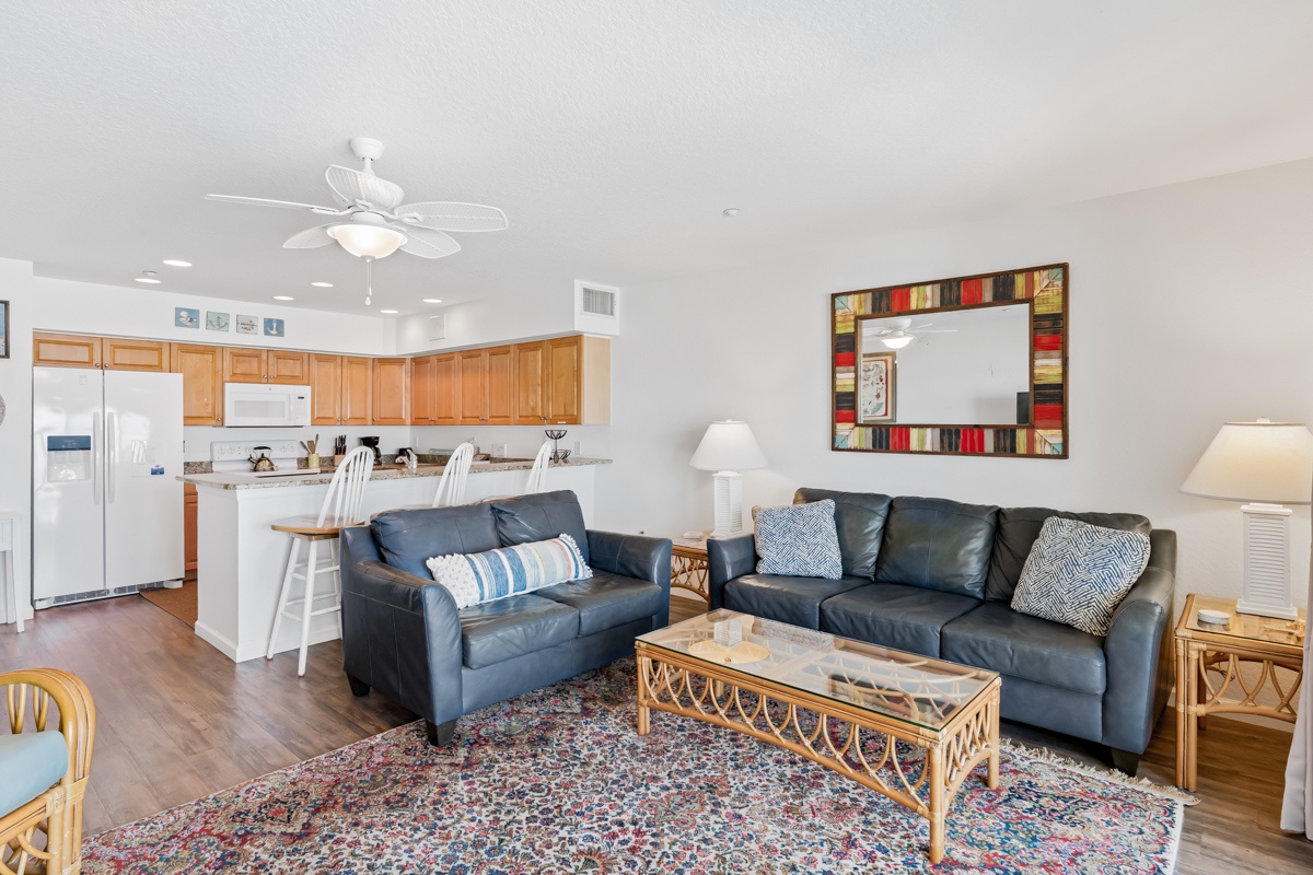 Relax in your spacious open-plan retreat with plush leather seating, fully equipped kitchen, and coastal-inspired decor that feels like home.