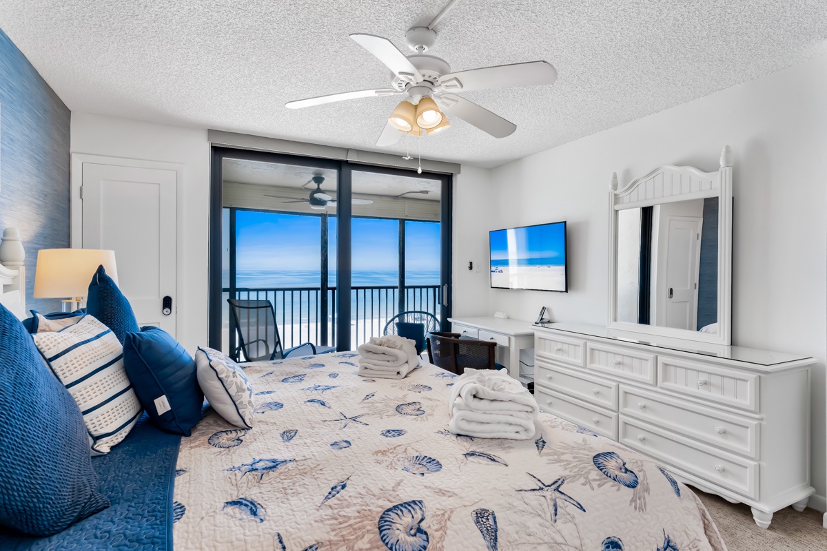 Wake up to soothing ocean views right from your bed. This King size with ensuite coastal-inspired bedroom features a private balcony where you can sip your morning coffee while watching the waves roll in.