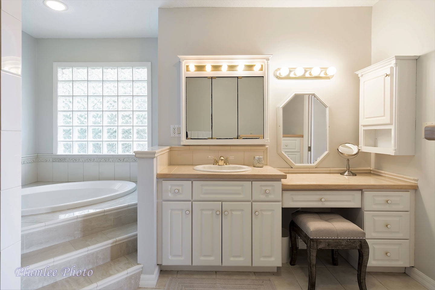 Convenient sink and vanity area in the master bathroom.