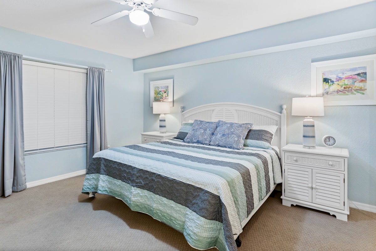 Drift off peacefully in your coastal-inspired bedroom, where soft blue walls and ocean-themed bedding create your perfect seaside retreat.