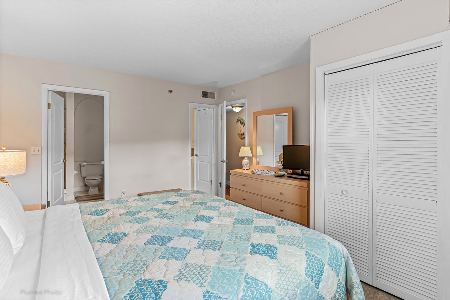 Bedroom has private bathroom and access to hall bathroom