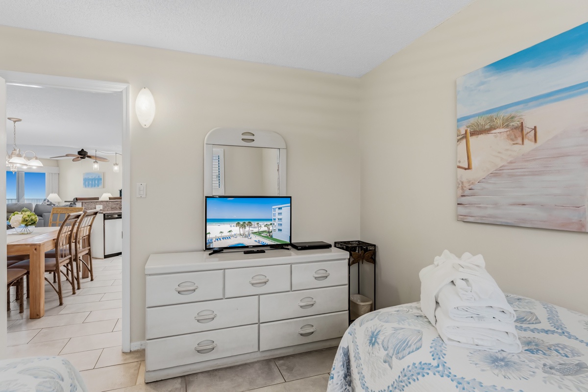 Coastal serenity meets everyday comfort in your light-filled bedroom. Fresh linens invite restful sleep, while beach-inspired decor sets a tranquil tone for your getaway.