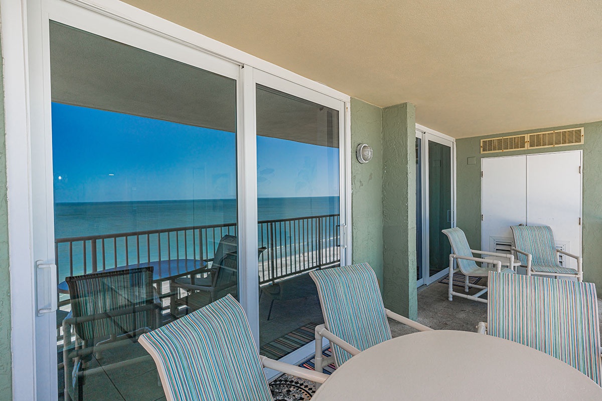 Your private oceanfront balcony offers stunning sea views and comfortable seating for morning coffee or sunset cocktails.
