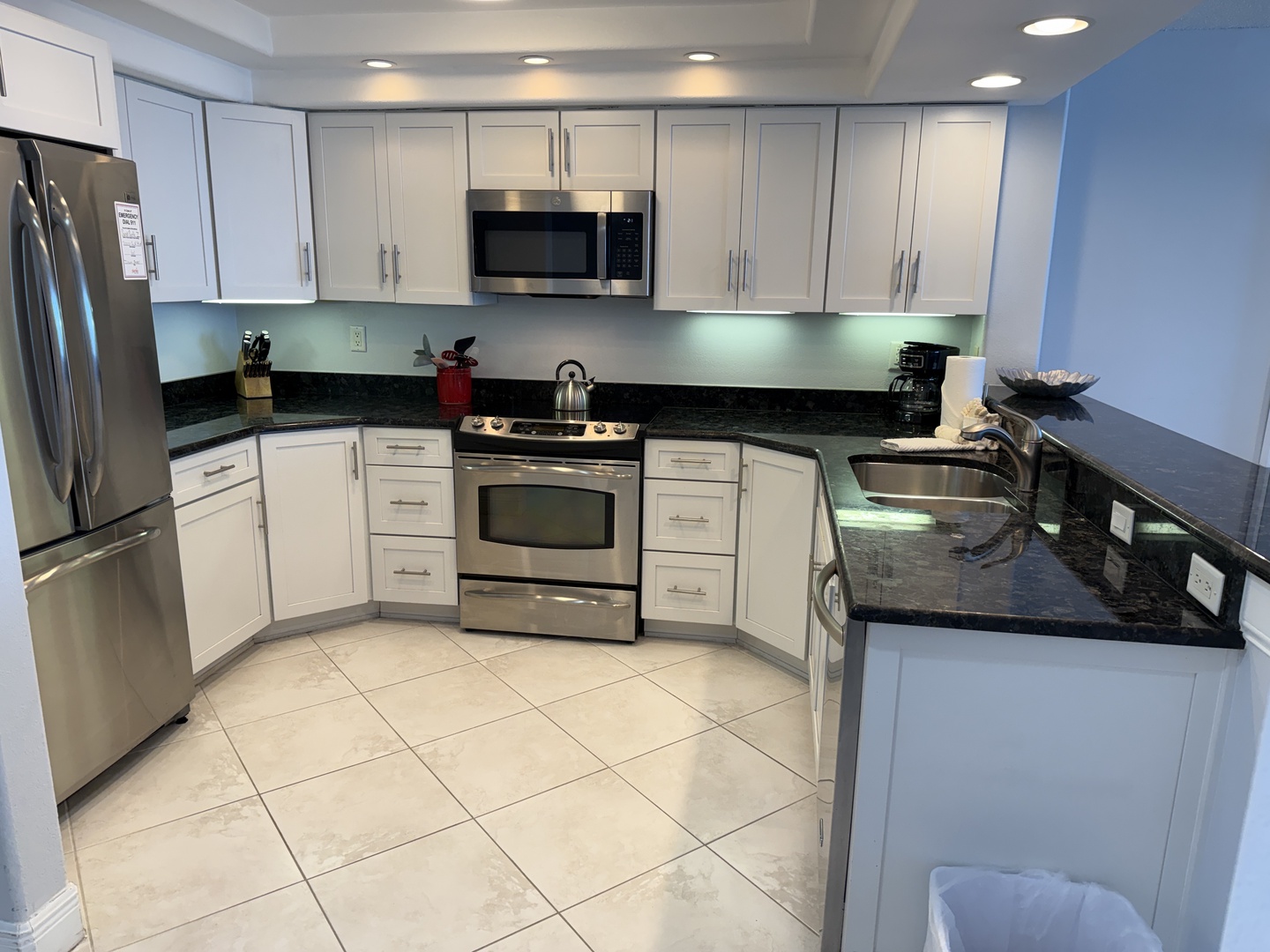 Your fully-equipped modern kitchen features granite counters, stainless appliances, and everything you need to prepare memorable meals during your stay.