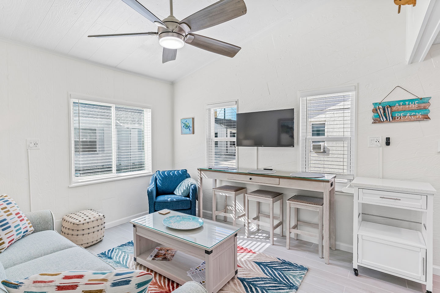 Living room with smart TV and ceiling fan