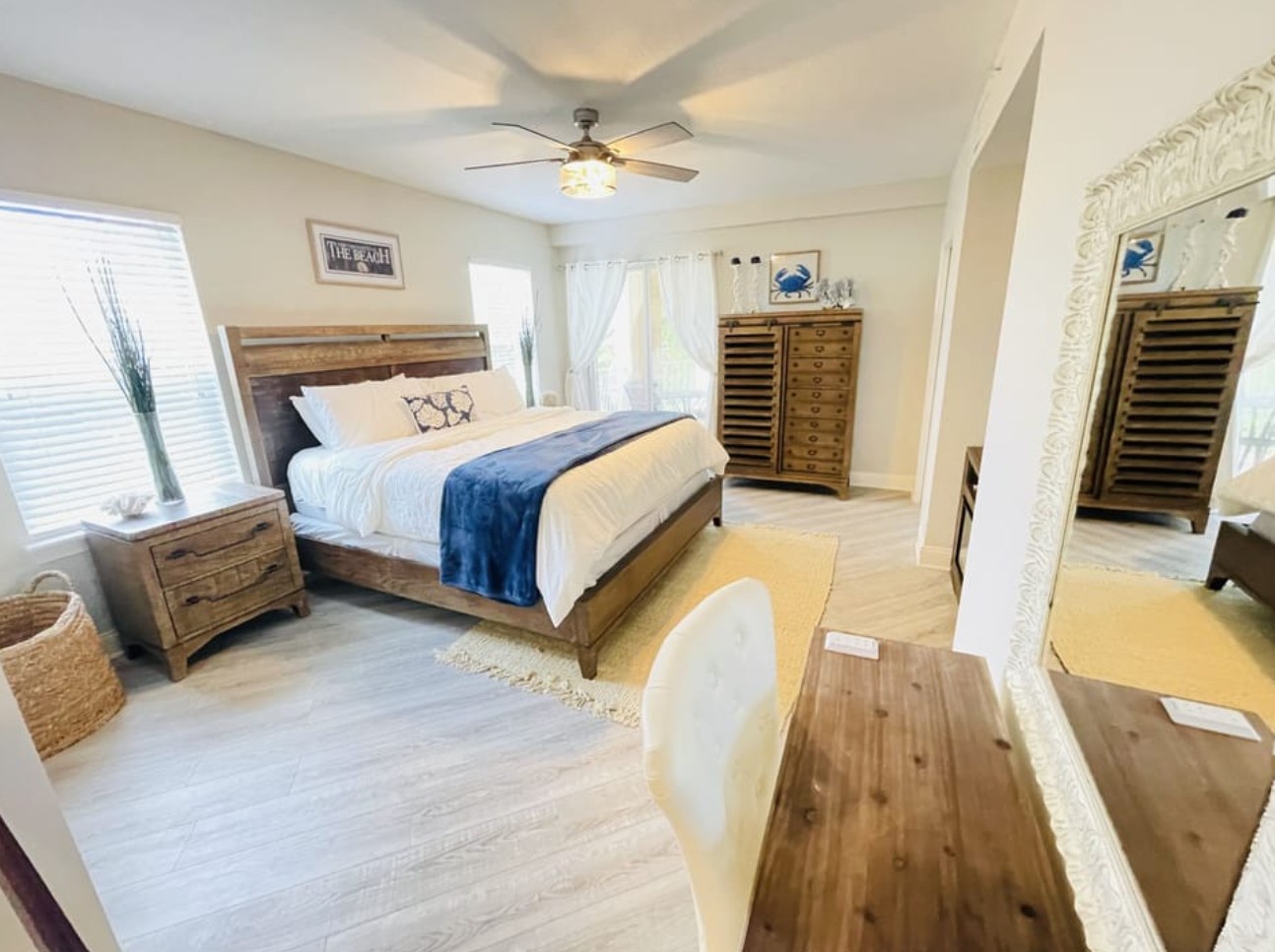 Primary bedroom with King bed, TV and desk