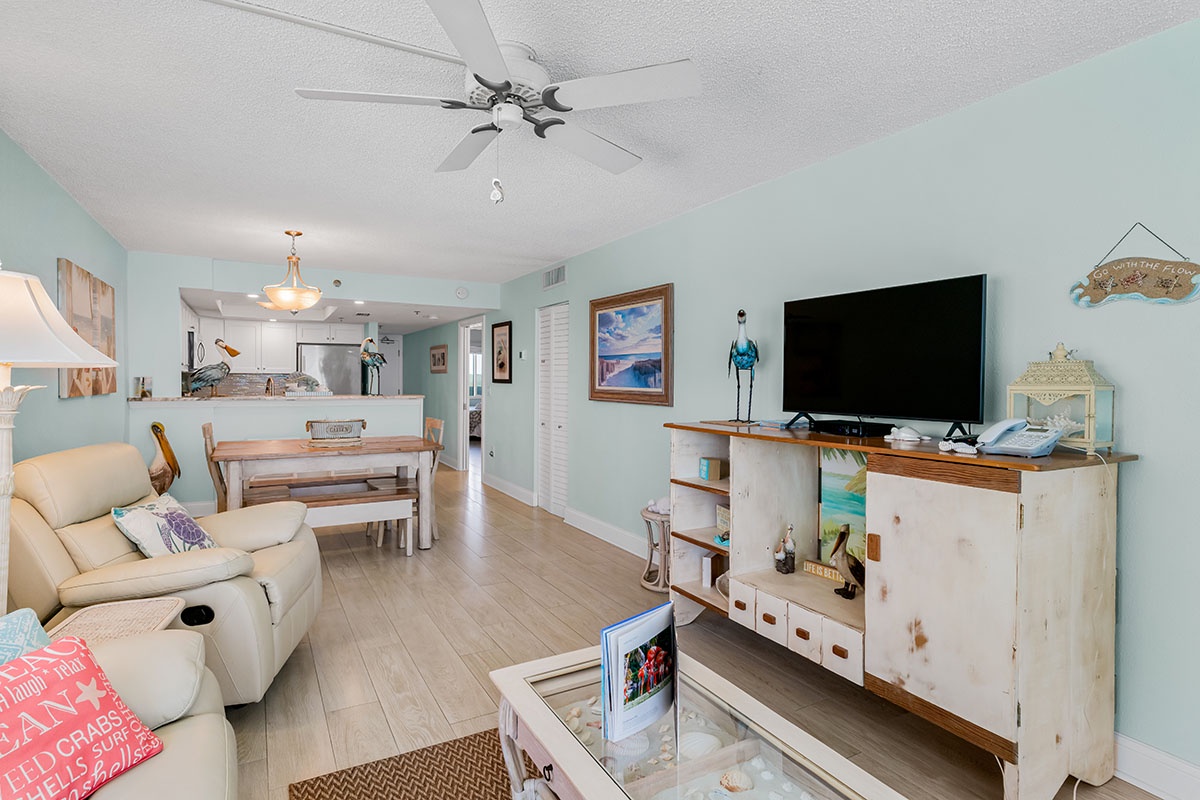 Relax in your bright living space where coastal colors meet comfort—perfect for unwinding after beach days.