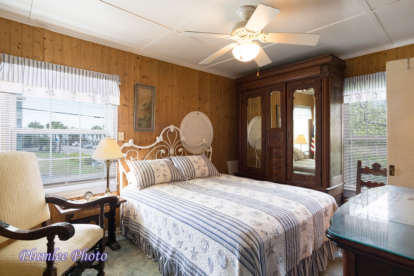 2nd Floor.  The Master Bedroom has a queen size bed and antique armoire.