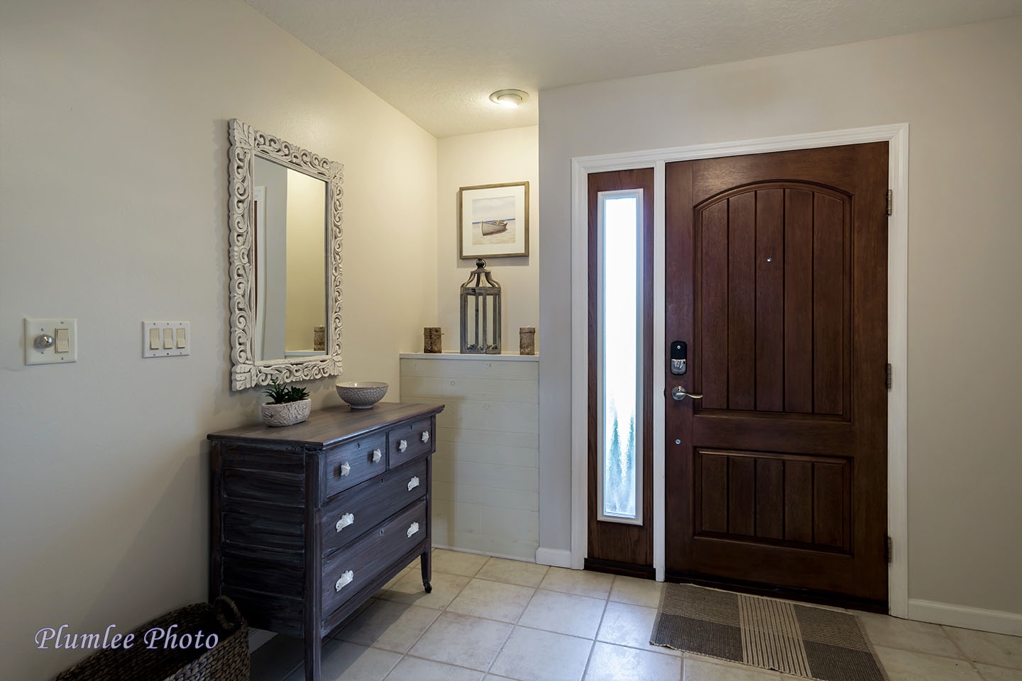 The foyer welcomes guests inside the house.