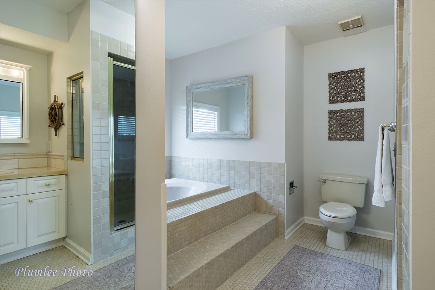 A large tub in the family bathroom can be a handy spot for bathing the little ones.