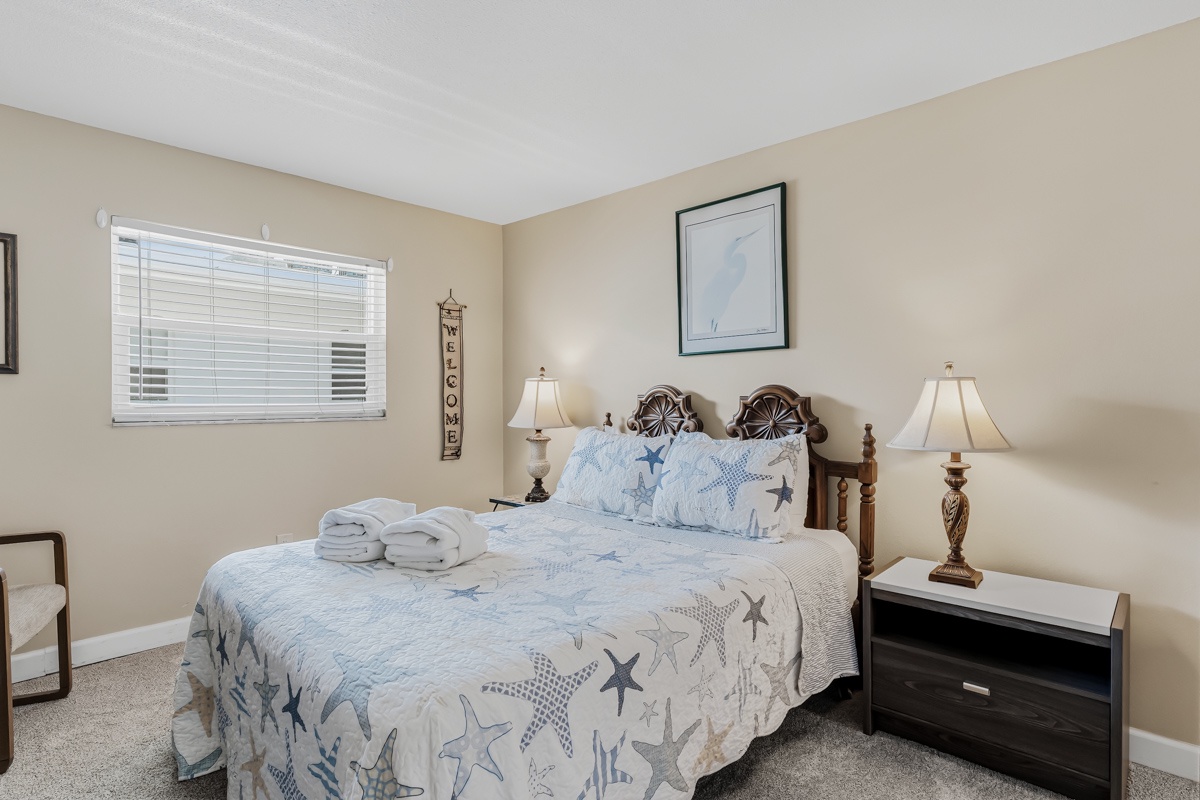 Drift off peacefully in your private retreat, with coastal bedding inviting you to relax after a day of coastal adventure.