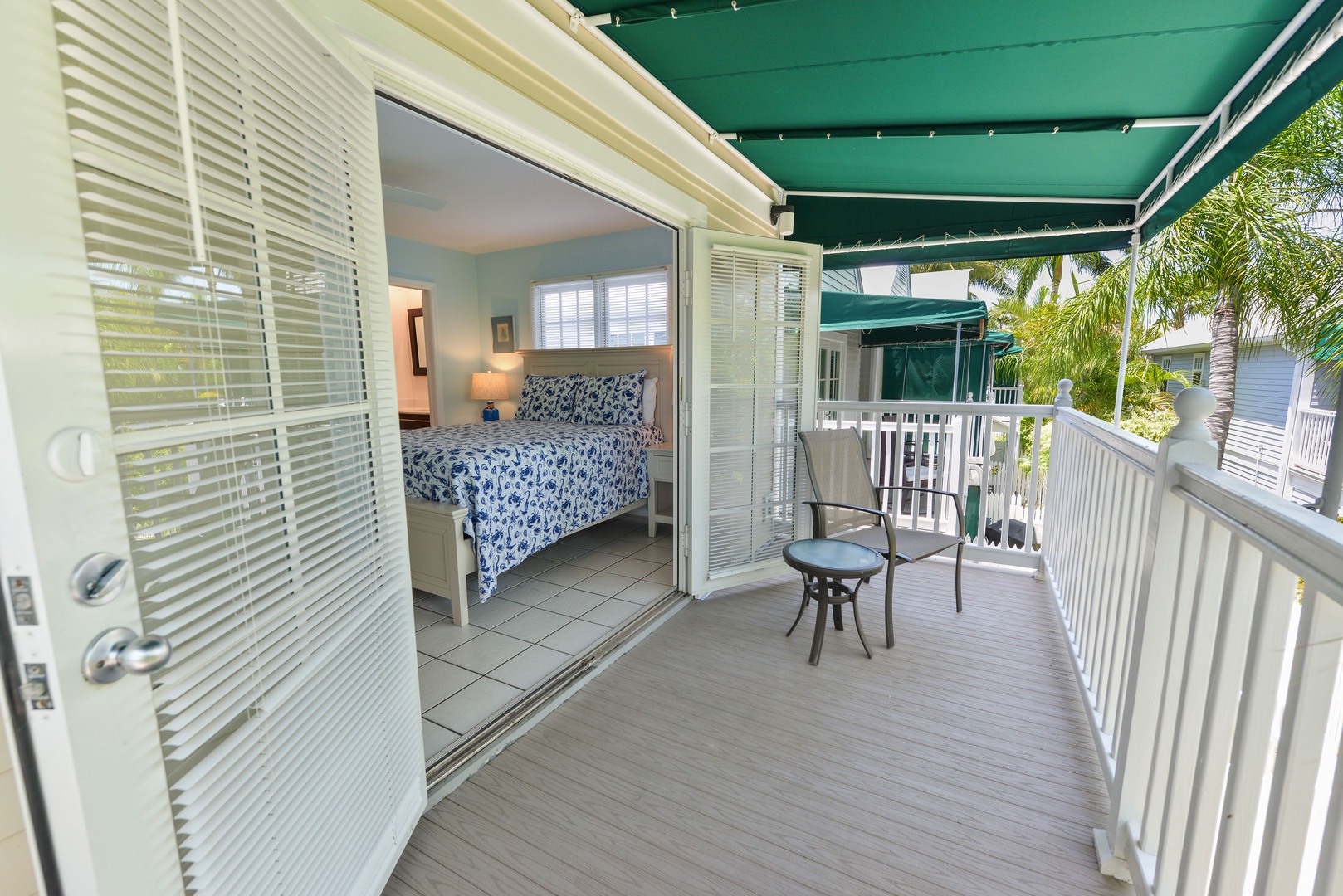 Walk out covered balcony with seating