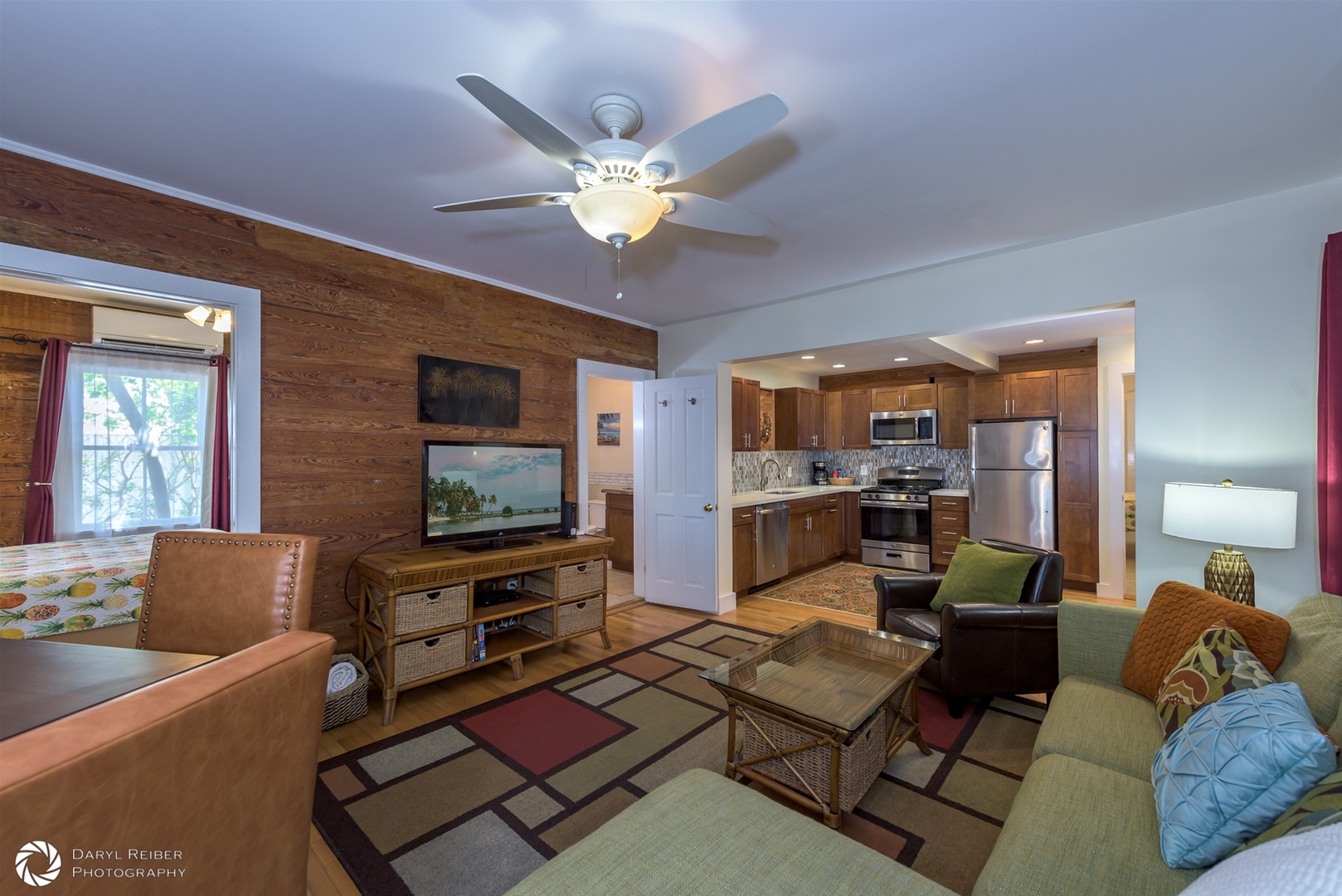 Living Room with view of Kitchen and door to Full Bathroom