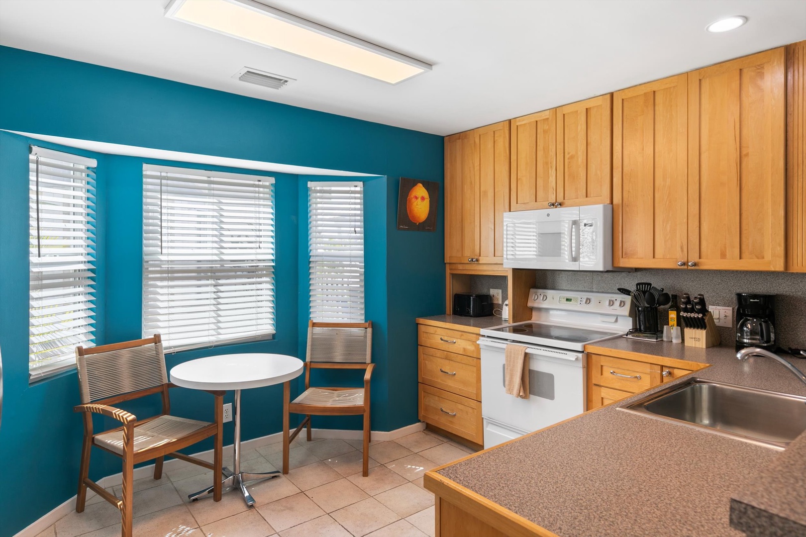 Fully equipped kitchen with everything you need with a nice place to sit and have your morning coffee
