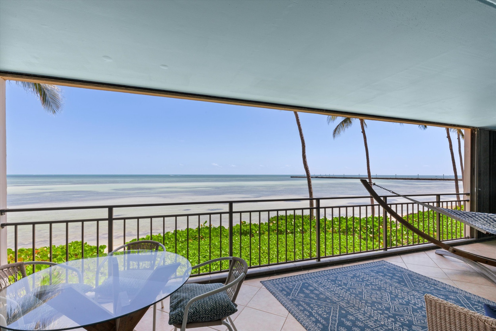 Oceanfront balcony with seating