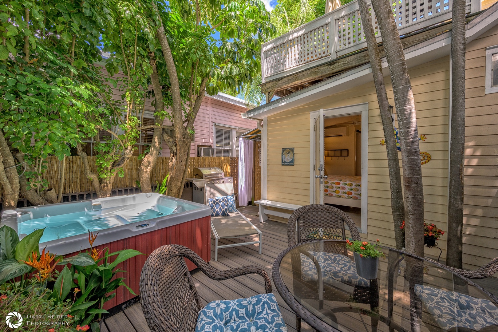 Private Deck with seating area and gas grill accessible through 2nd Bedroom