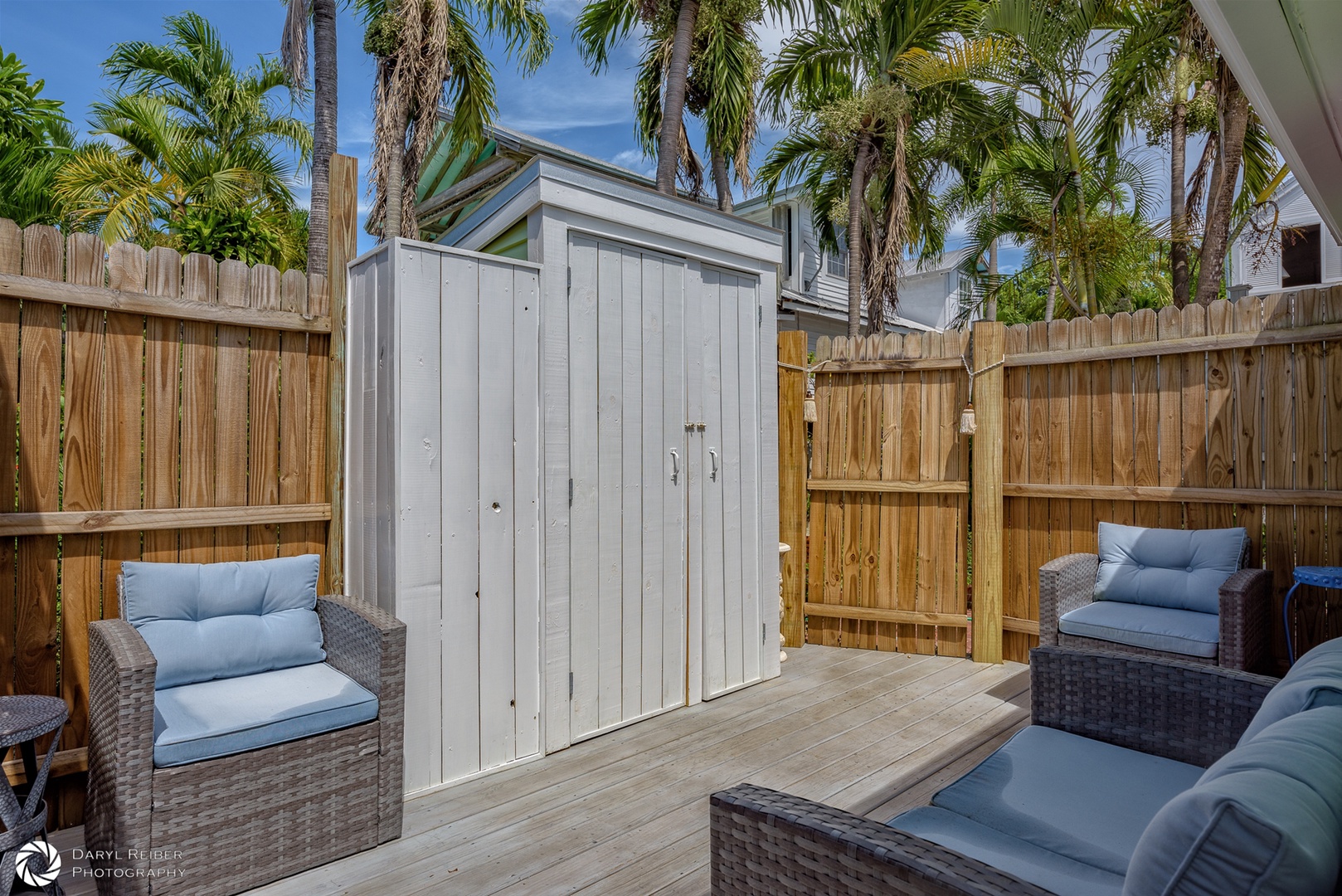 Gate entrance to private deck with outdoor laundry closet