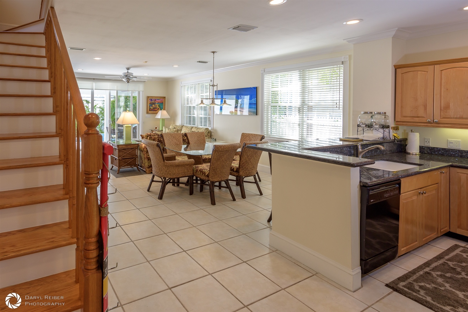 Full view dining area, living room from landing of stairs