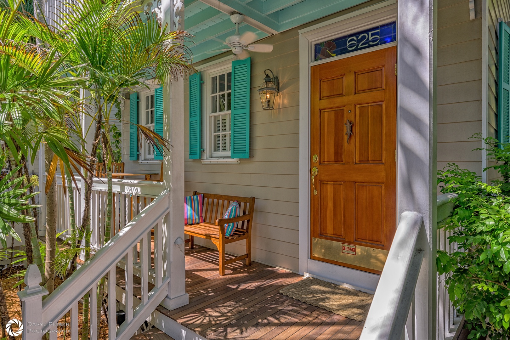 Main entrance on covered porch with seating