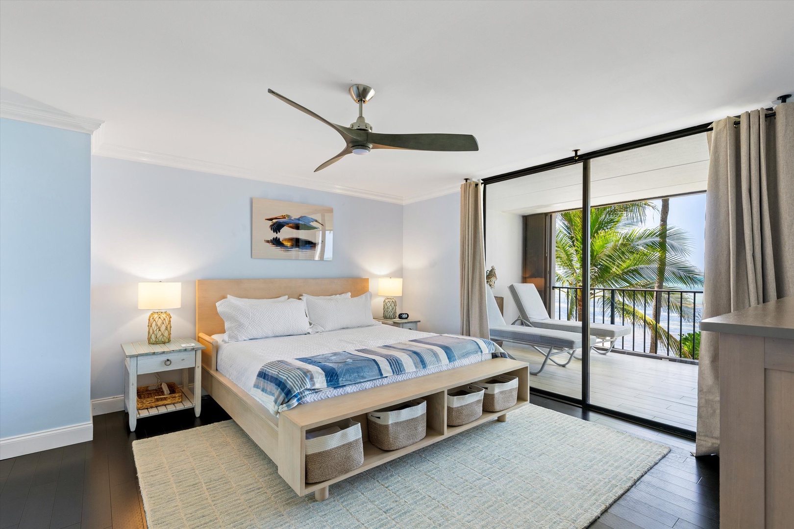 Primary bedroom with walk out balcony and seating