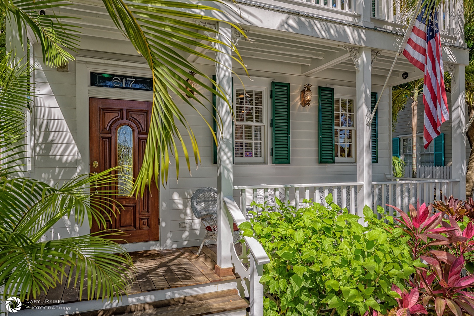 Main entrance on covered porch with seating