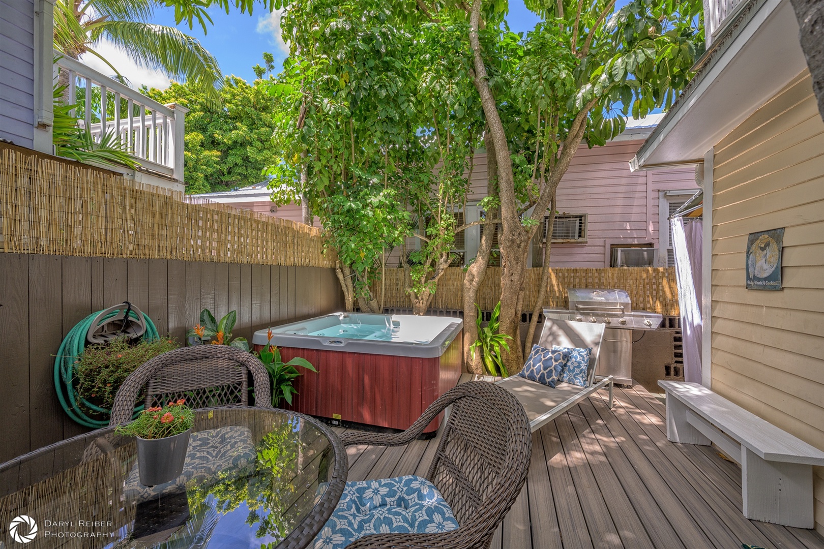 Private Deck with hot tub, seating area and gas grill