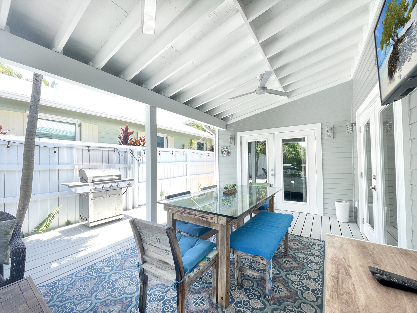 Covered Deck with Dining Area and gill