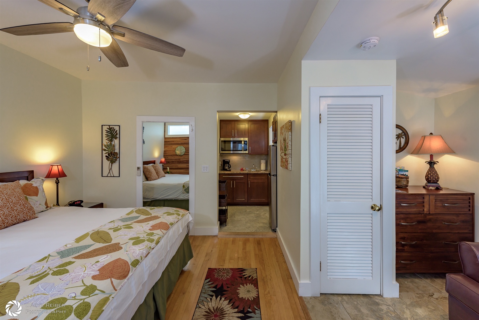 View from Main Entry into bedroom with view into kitchenette