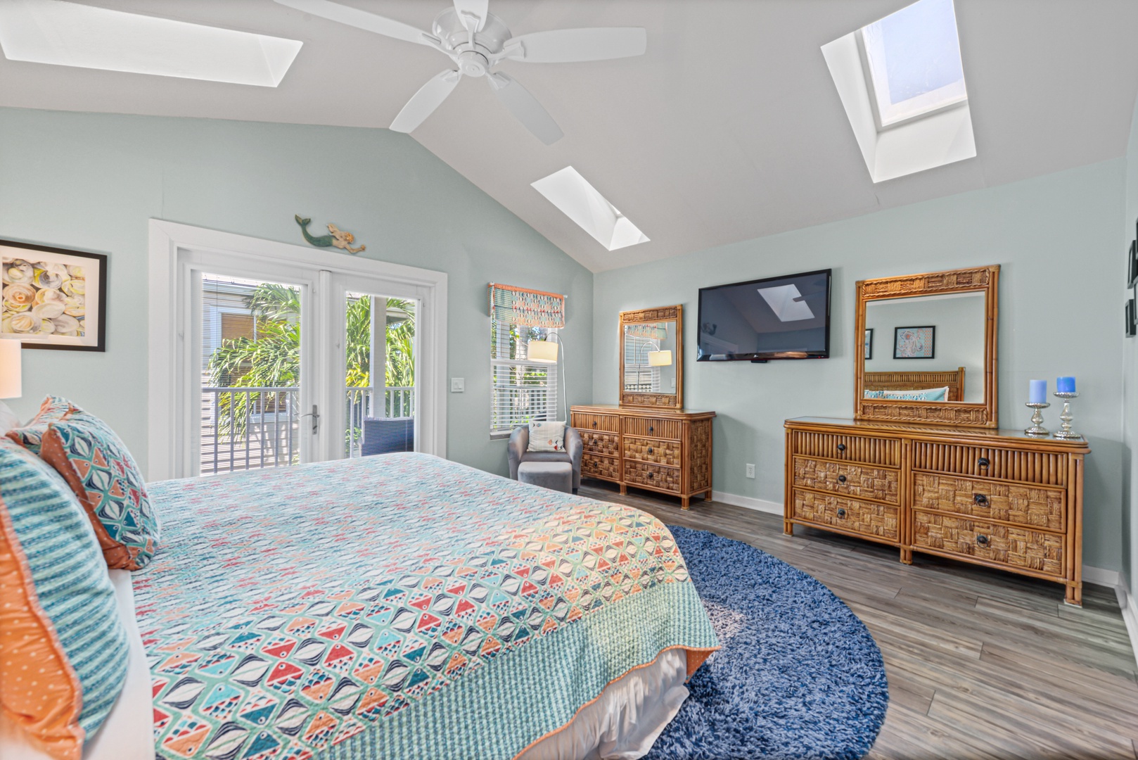 Paradise Place #5 @ Duval Square Key West Primary Bedroom showing Private Balcony Doors
