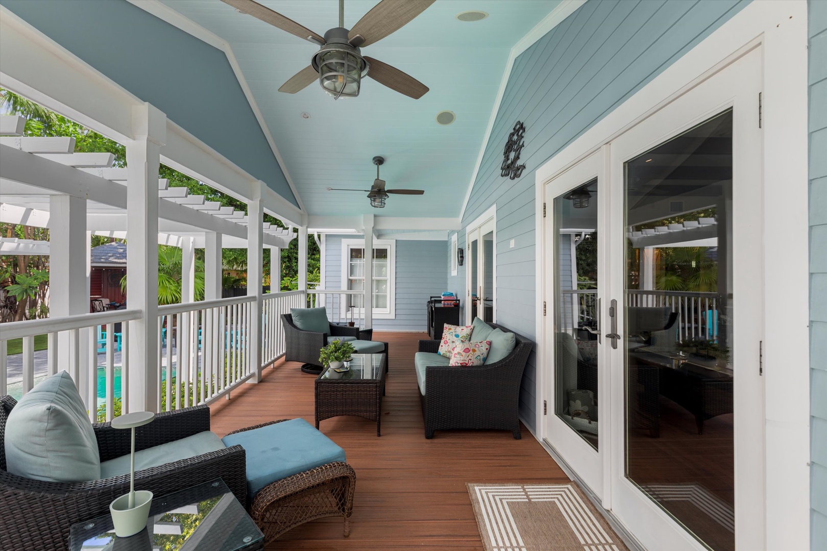 Covered back porch seating area