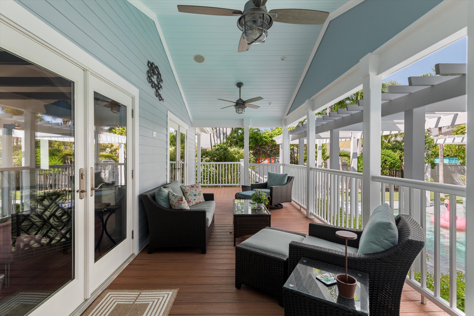 Covered back porch seating area