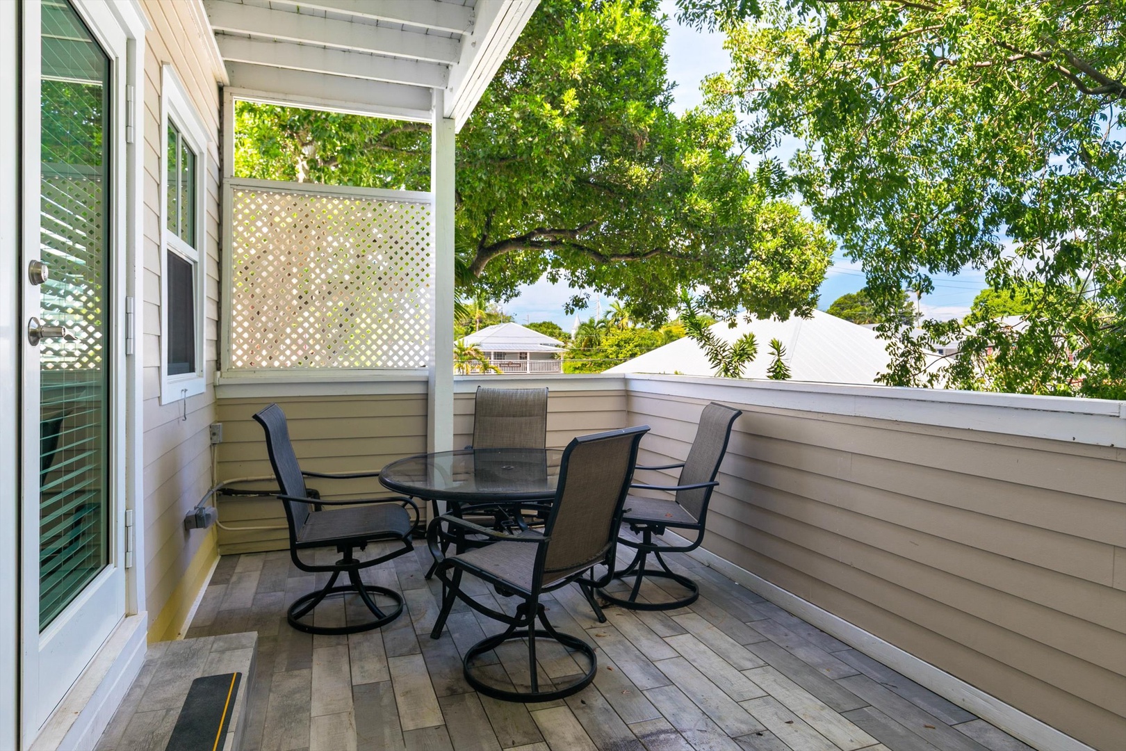 Sip morning coffee at your private balcony table, where leafy views and a quiet breeze set the perfect scene for unwinding.