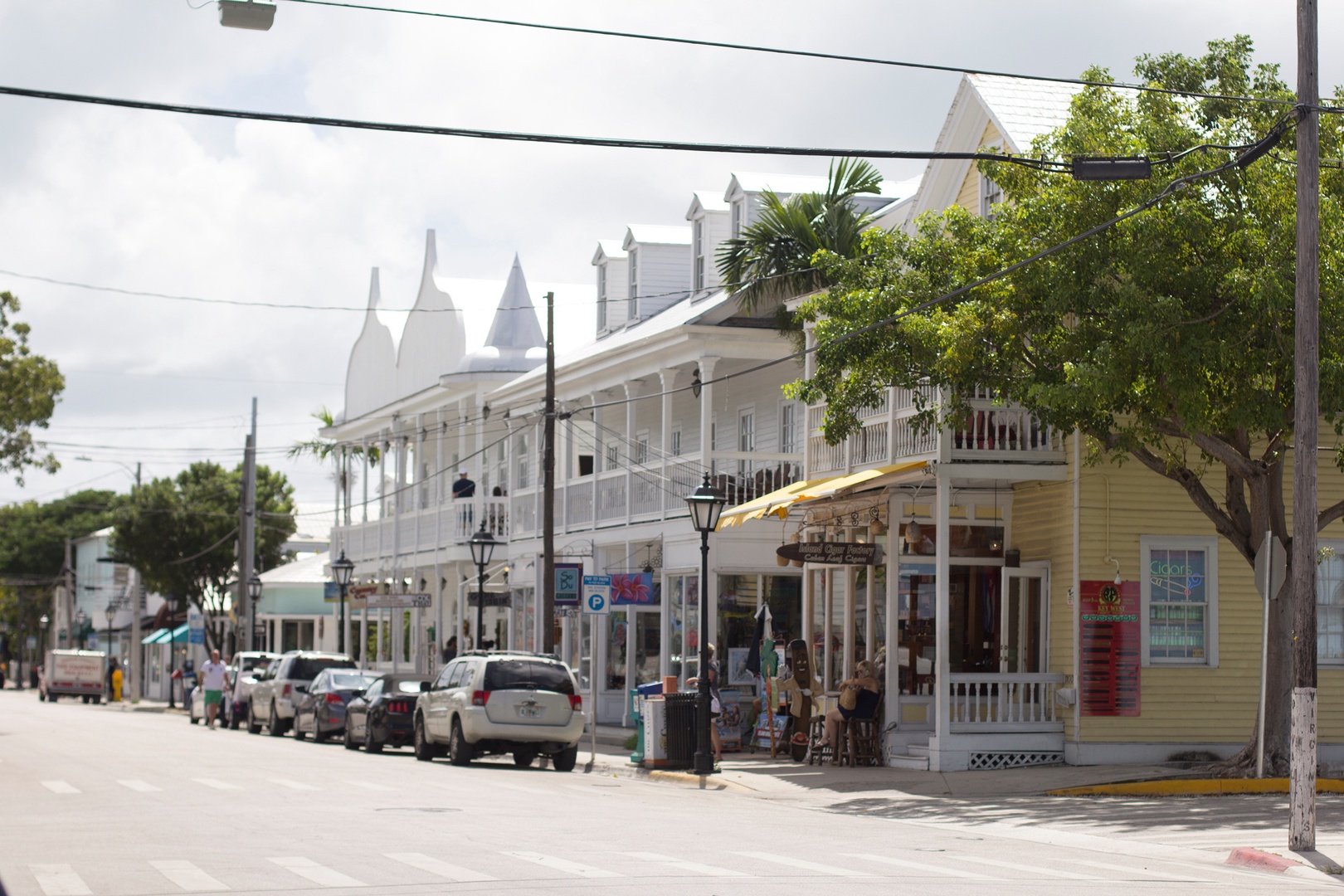 A charming street in the surrounding neighborhood features colorful local shops and island architecture, adding character to the area during your stay.