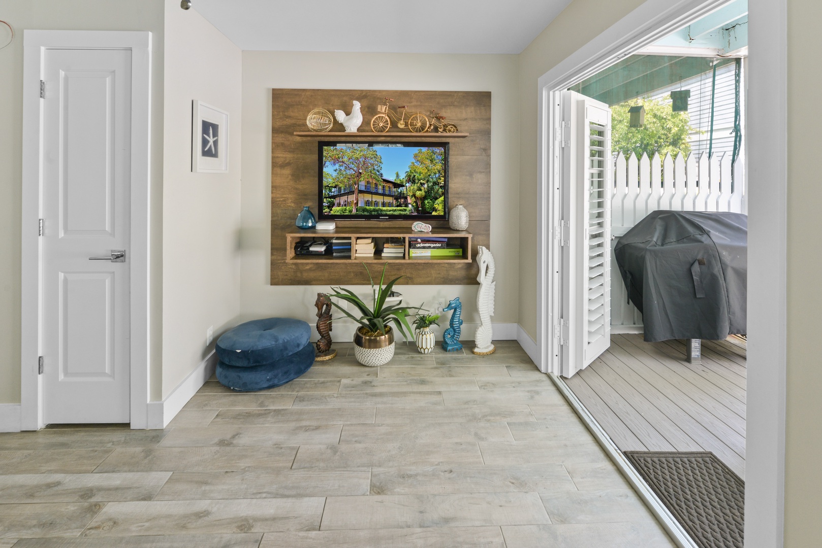 Living Room with french doors that open onto covered deck