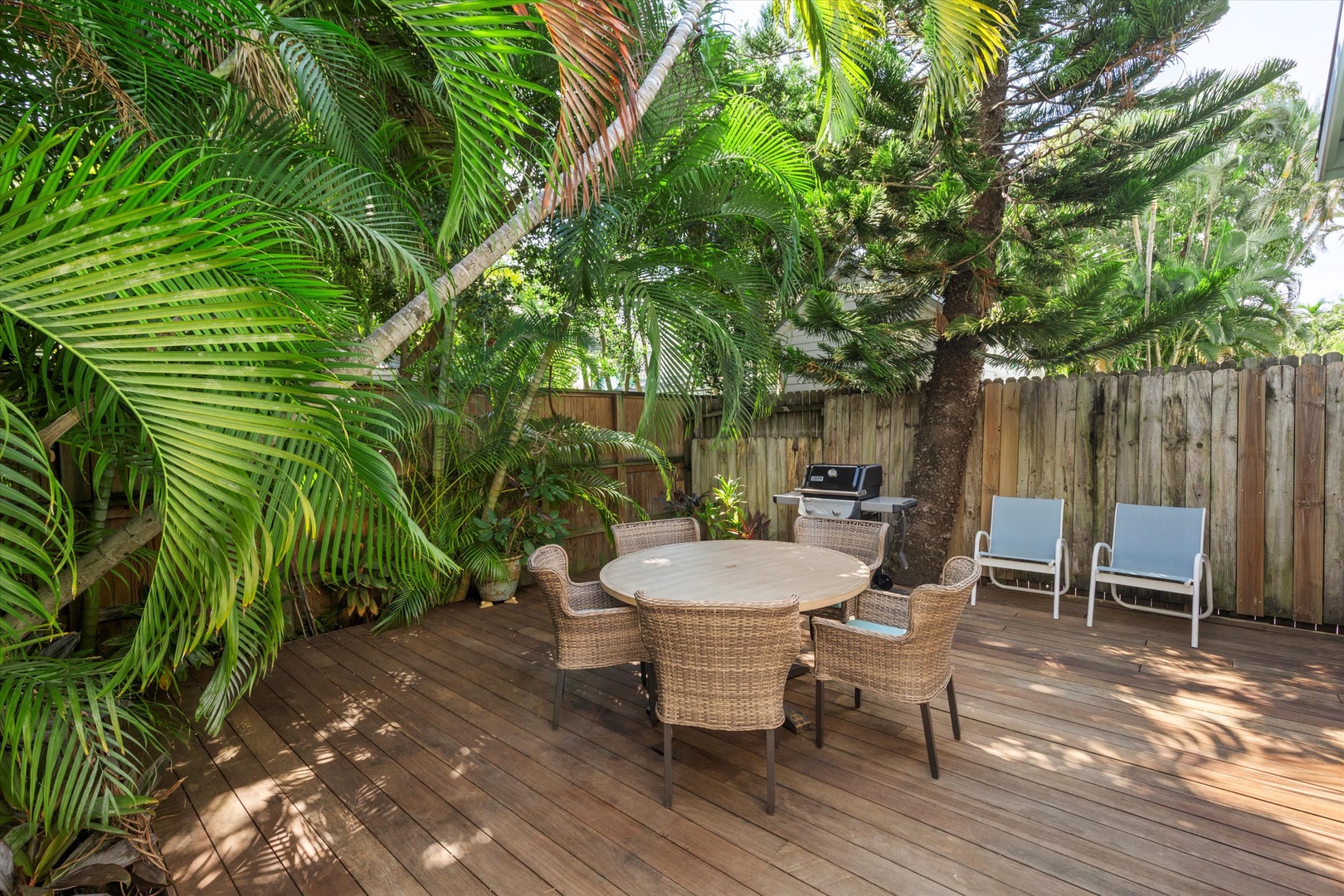 Private patio area with grill