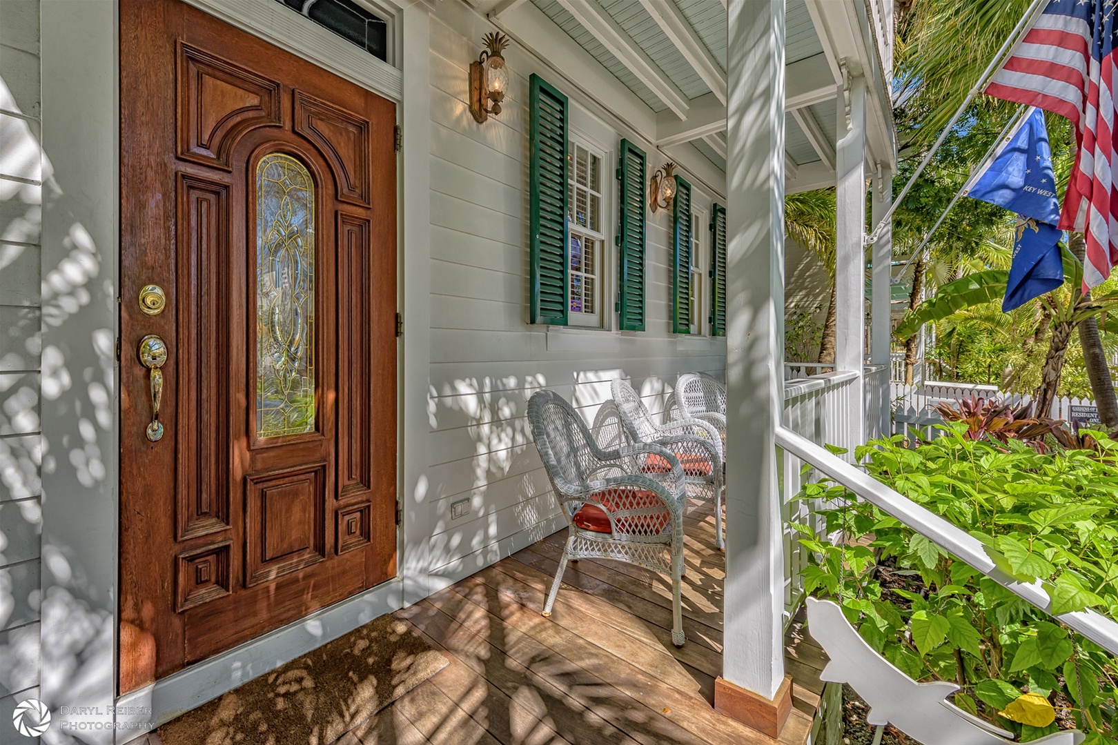 Main entrance on covered porch with seating