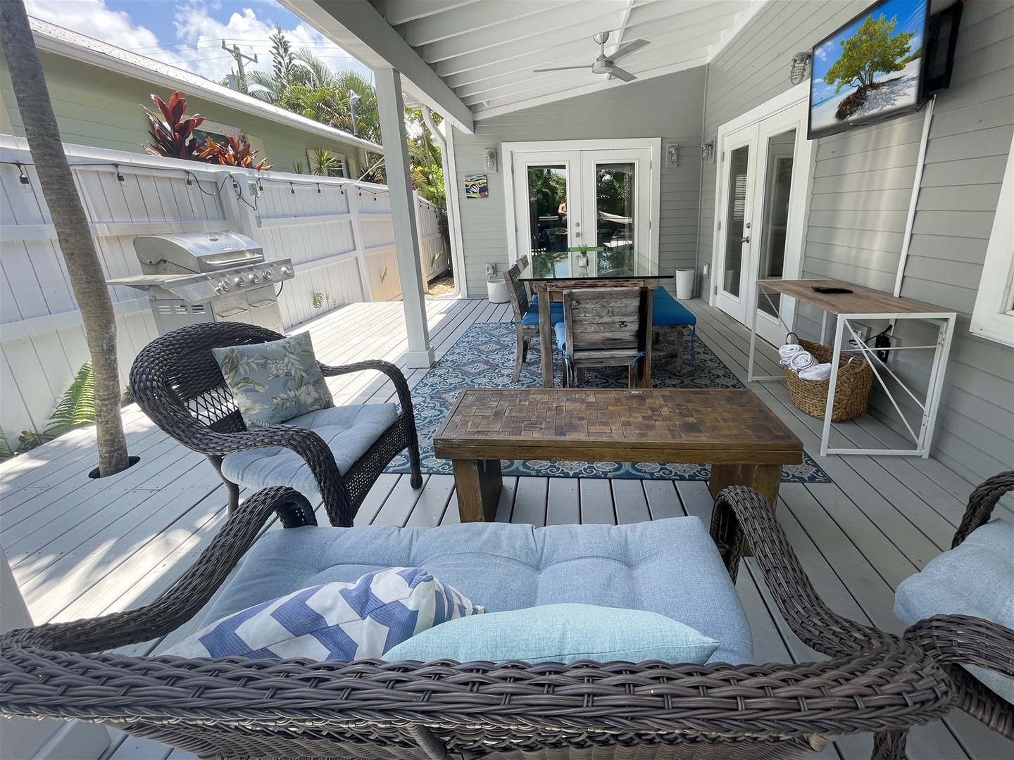 Covered Deck with seating and dining area