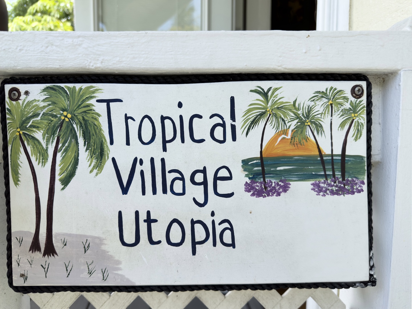 Door sign for Utopia @ Tropical Village