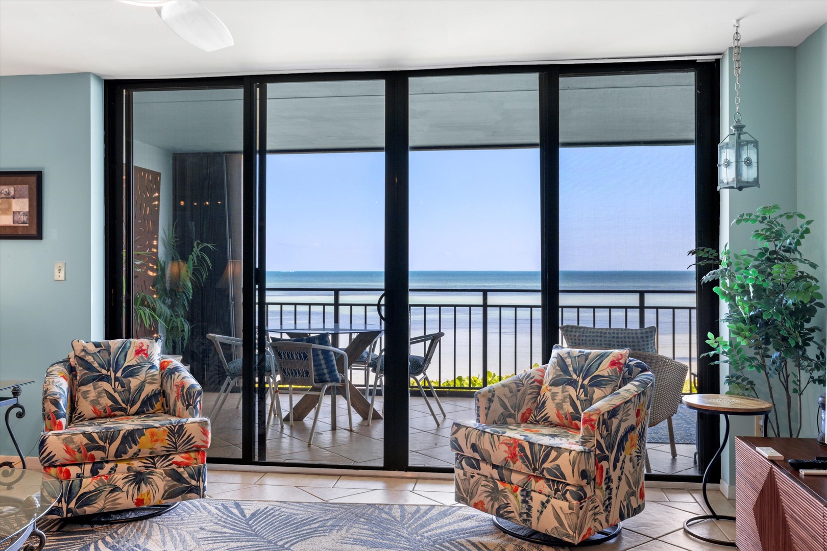 Living room with oceanfront view balcony