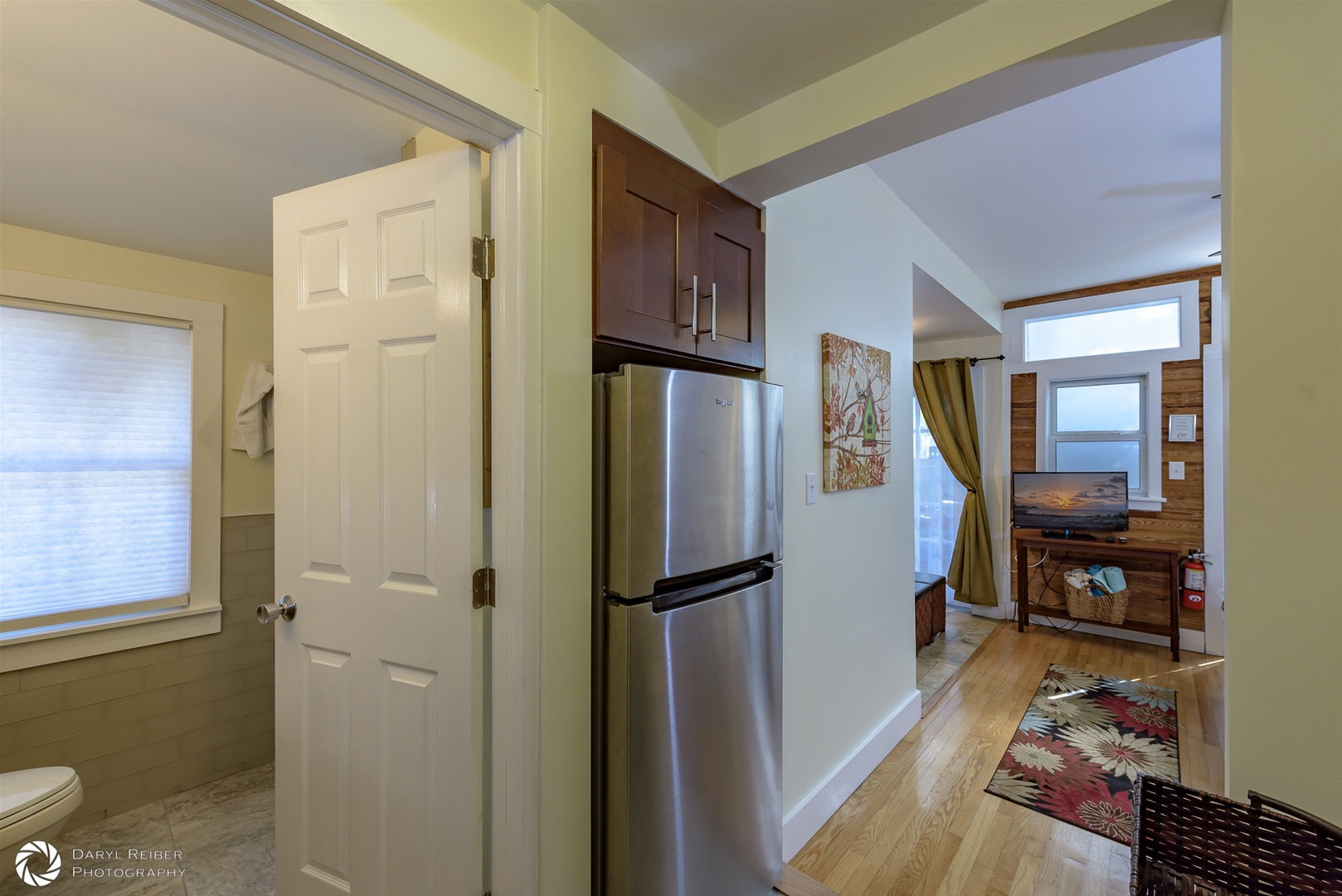 Refrigerator and door to full bathroom