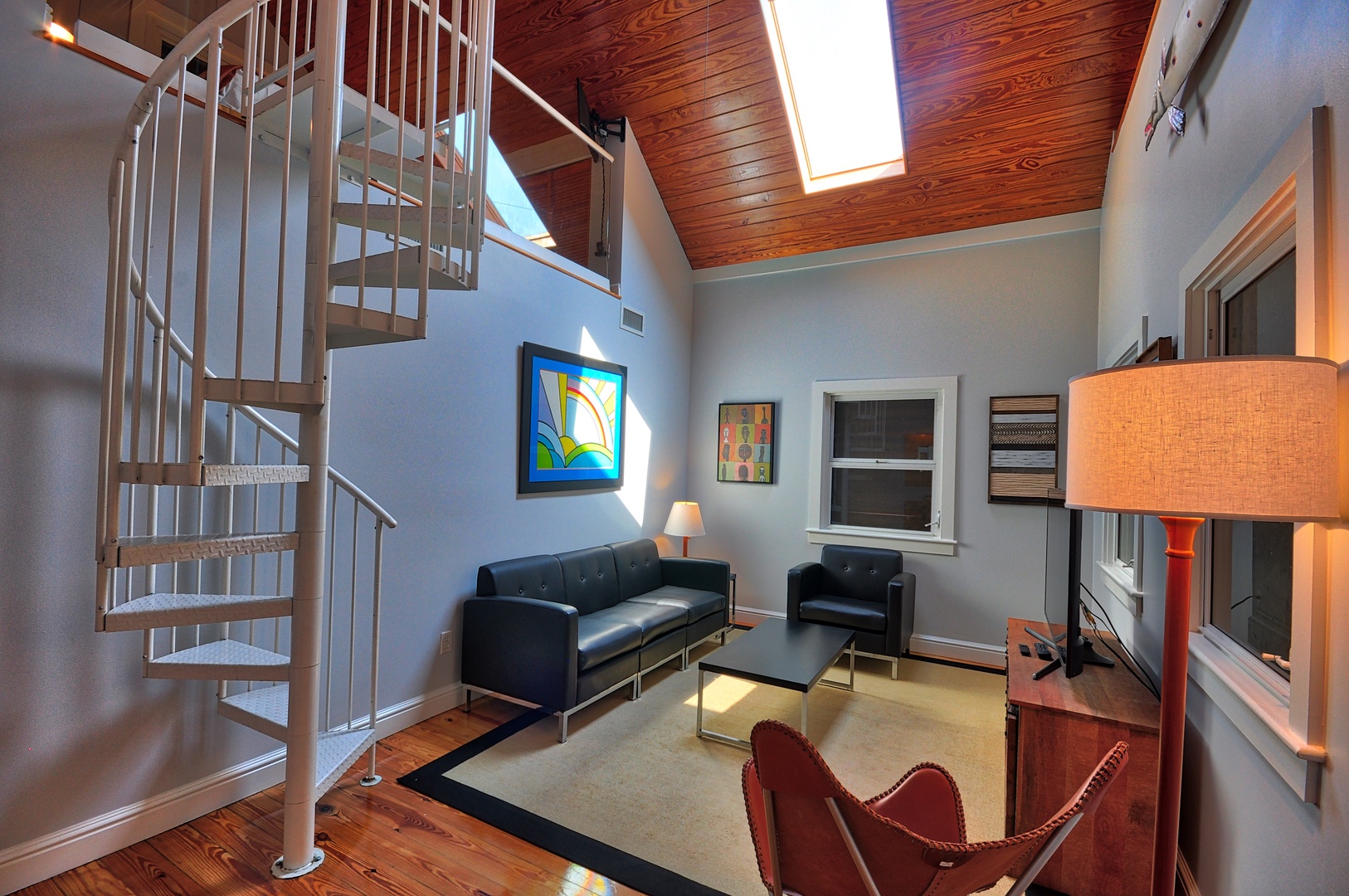 Pete's West Cottage Key West Living Room with Spiral Staircase to Loft