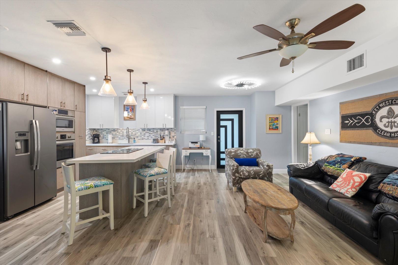 Kitchen with breakfast bar and sitting area
